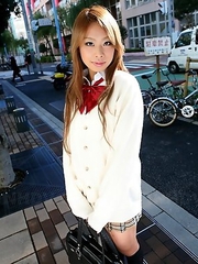 Remika Uehara poses on the street