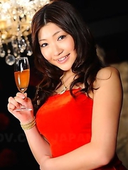 Karin Kusunoki poses in red dress