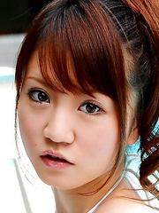 Lovely Japanese babe enjoys posing