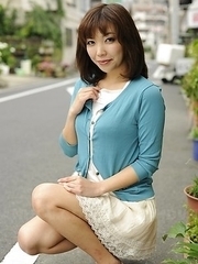 Juri Kitahara in blue sweater and lace skirt