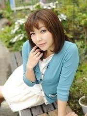 Juri Kitahara in blue sweater and lace skirt
