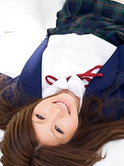 Risa Aika with cute smile shows crack in thong under skirt