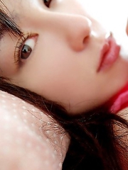 Rina Akiyama with sexy lips rubs her cunt of bar outdoor