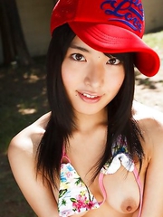 Kana Yume shows nude playful tits and hairy cunt in nature