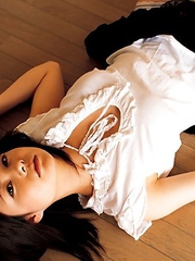 Akina Suzuki in panty takes bra off but hides her big jugs