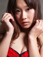 Kana Yuuki in heels and red lingerie shows ass in red panty