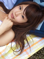 Manami Sato takes school uniform off and shows body outdoor