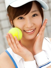 Kana Yuuki shows flexibility while playing with tennis ball