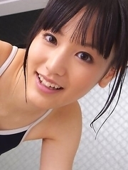 Yuri Hamada washes and showers her hot body over bath suit