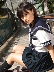 Japan teen Yuzuki Hashimoto in sailor gal uniform is playful outdoor