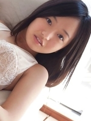 Mayumi Yamanaka with big hooters smiles and is very playful