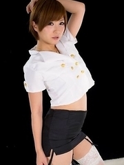 Short-haired teen in white stockings Kaede Oshiro is about to get fingered HARD